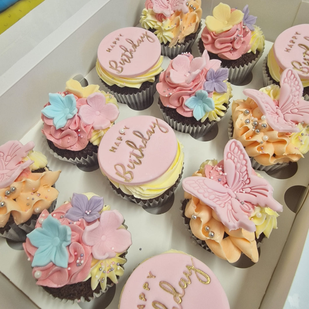 Cupcakes with flowers and butterflies